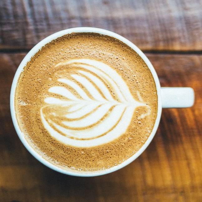 Flat white coffee with latte art